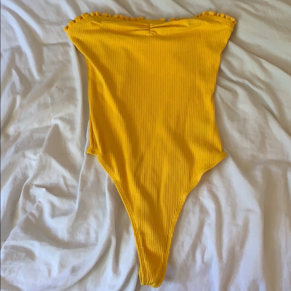 Yellow body suit